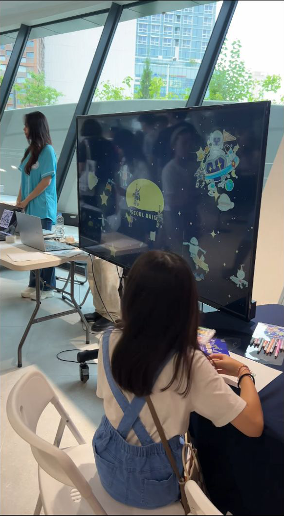 A visitor using Yusha at a self-serve event kiosk
